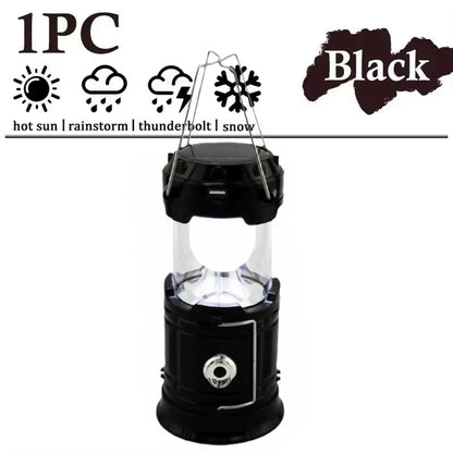 Black solar multifunctional handheld camping lamp, portable waterproof LED flashlight, energy-efficient emergency light.