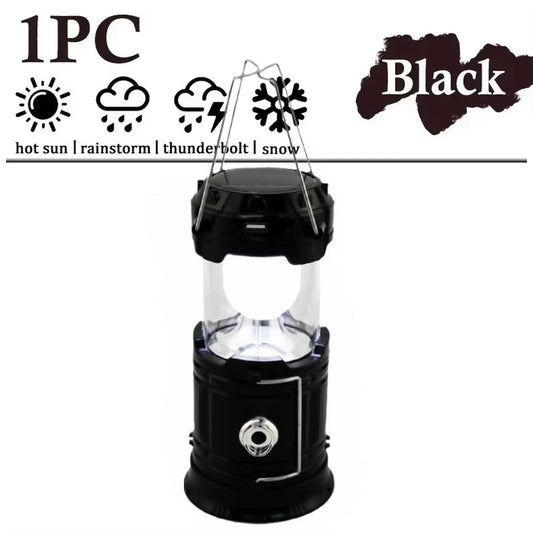 Black solar multifunctional handheld camping lamp, portable waterproof LED flashlight, energy-efficient emergency light.