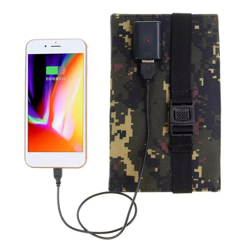 Portable solar panel folding bag charging a mobile phone, camouflage design.